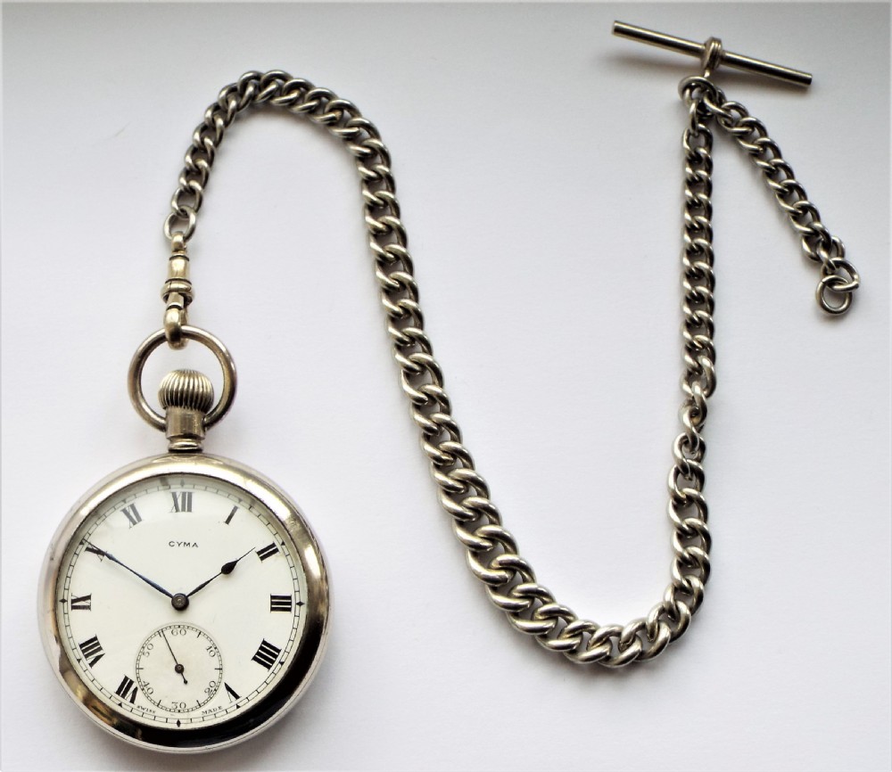 A 1920s Cyma pocket watch with chain. View III