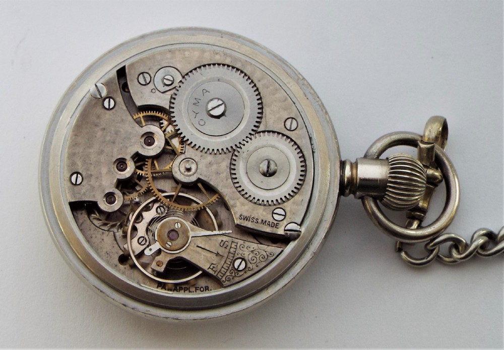 A 1920s Cyma pocket watch with chain. View IV