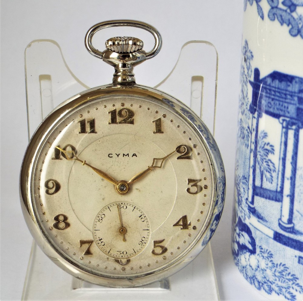 A 1930s Cyma pocket watch.