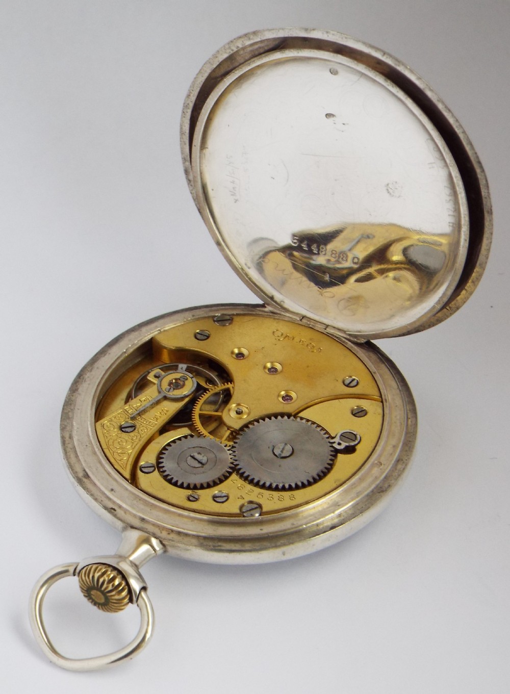 Antique silver Omega pocket watch. View IV