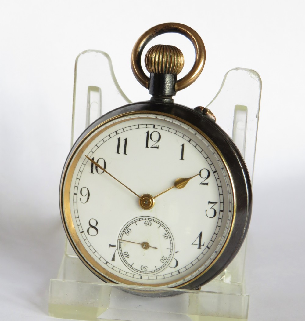Small antique gun metal pocket watch