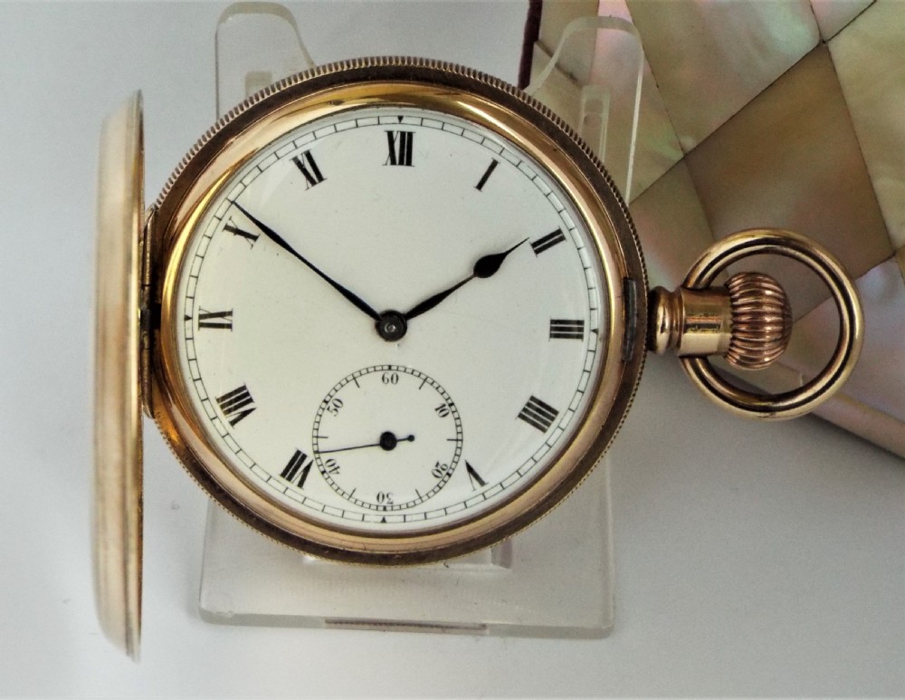 A 1920s Swiss full hunter pocket watch.