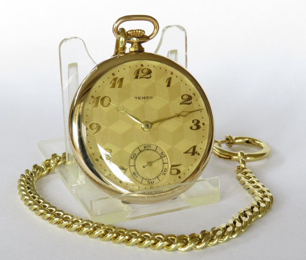 A 1930s Tempo pocket watch & chain.