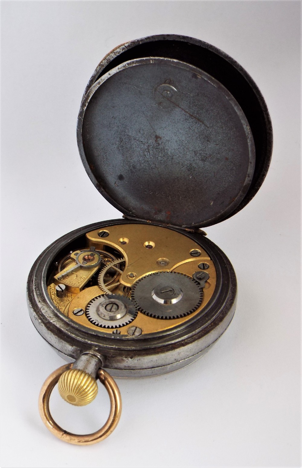 An antique gun metal Omega pocket watch. View IV