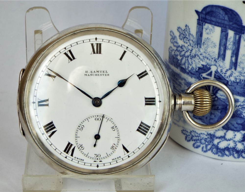 A 1919 silver Cyma pocket watch.
