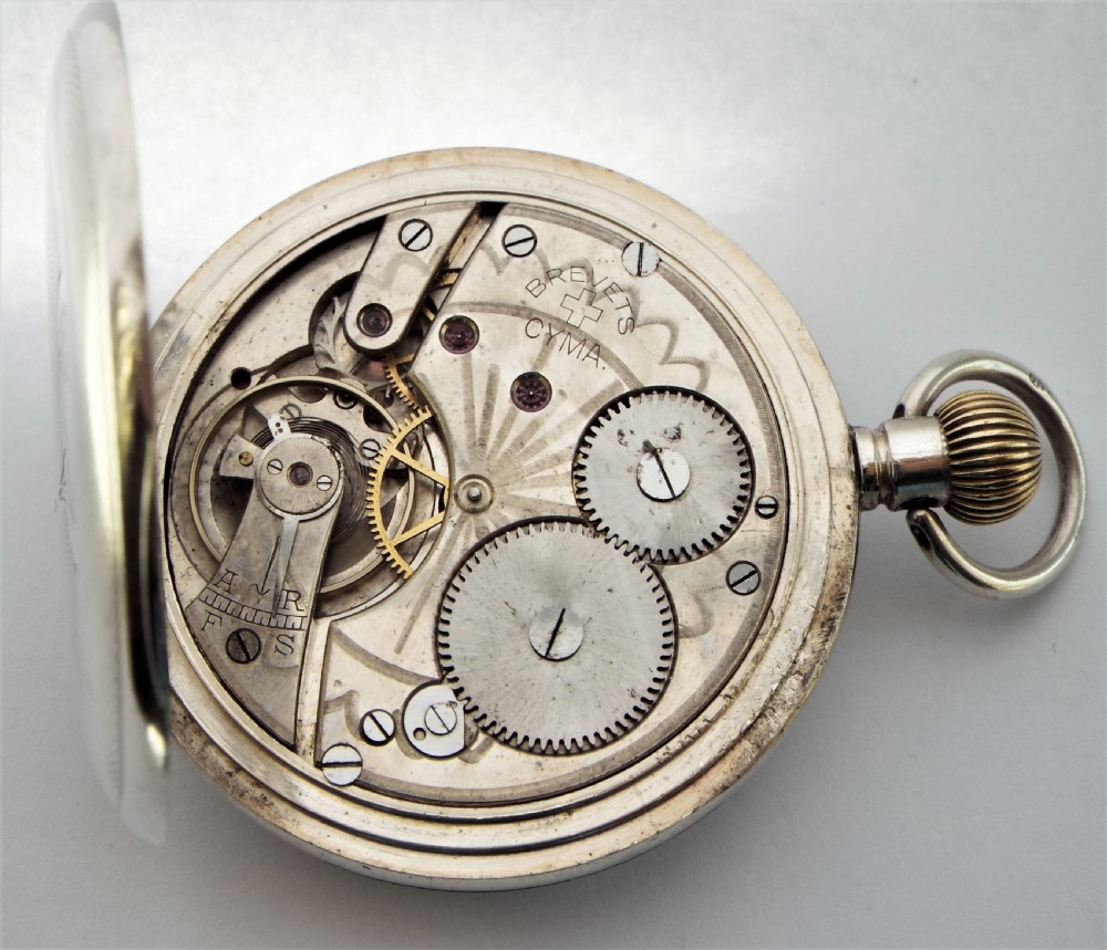 A 1919 silver Cyma pocket watch. View V