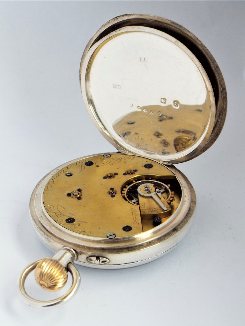 A late Victorian English silver pocket watch by the Errington Watch Company. View IV