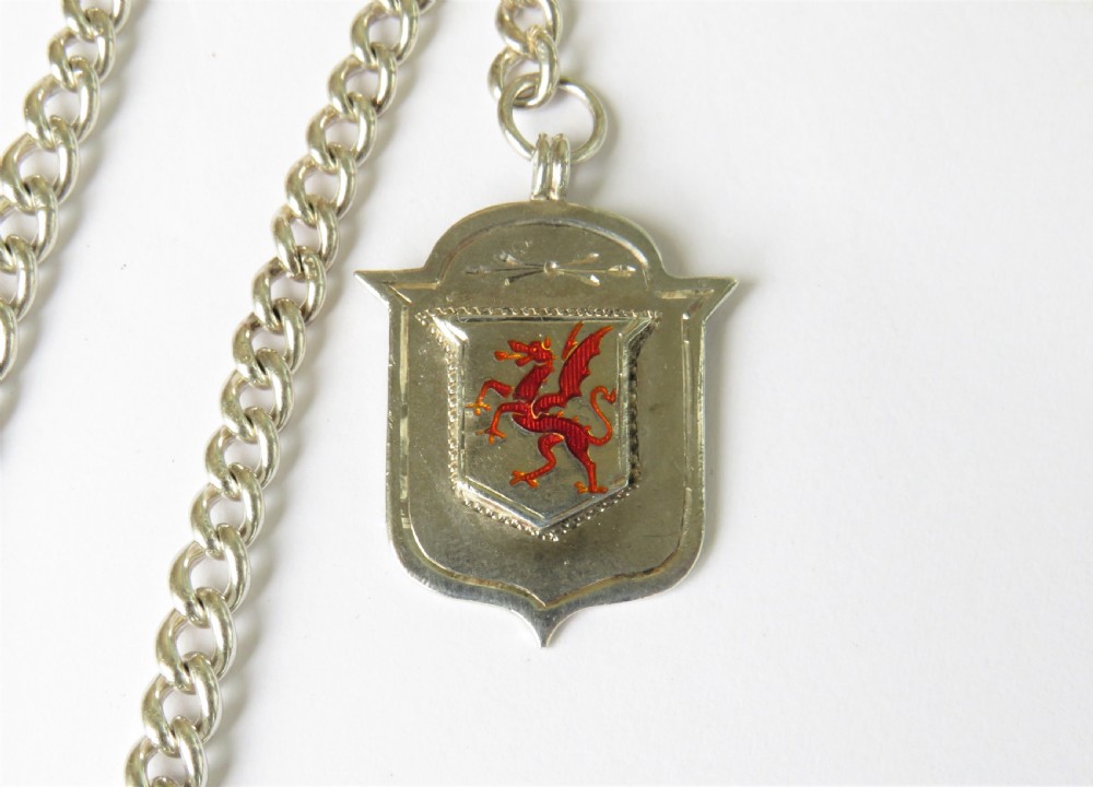 Antique silver watch chain and Welsh dragon fob View II