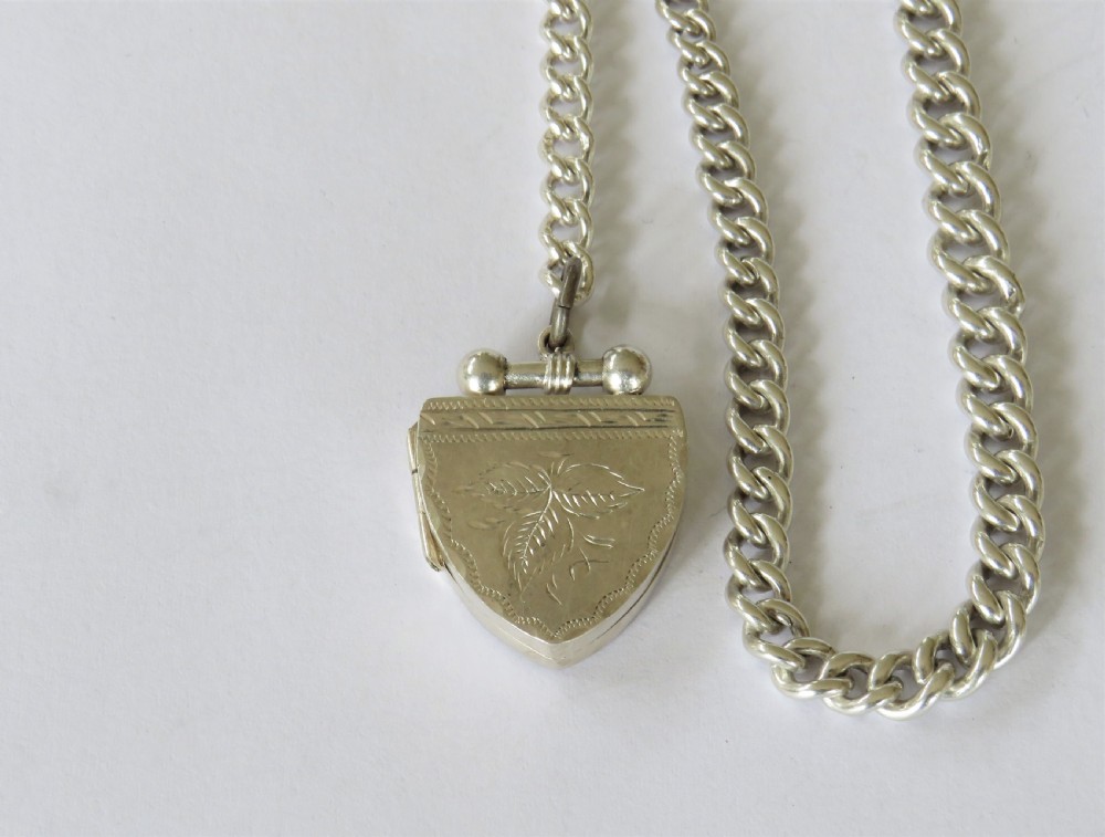 Antique silver watch chain with unusual locket View II