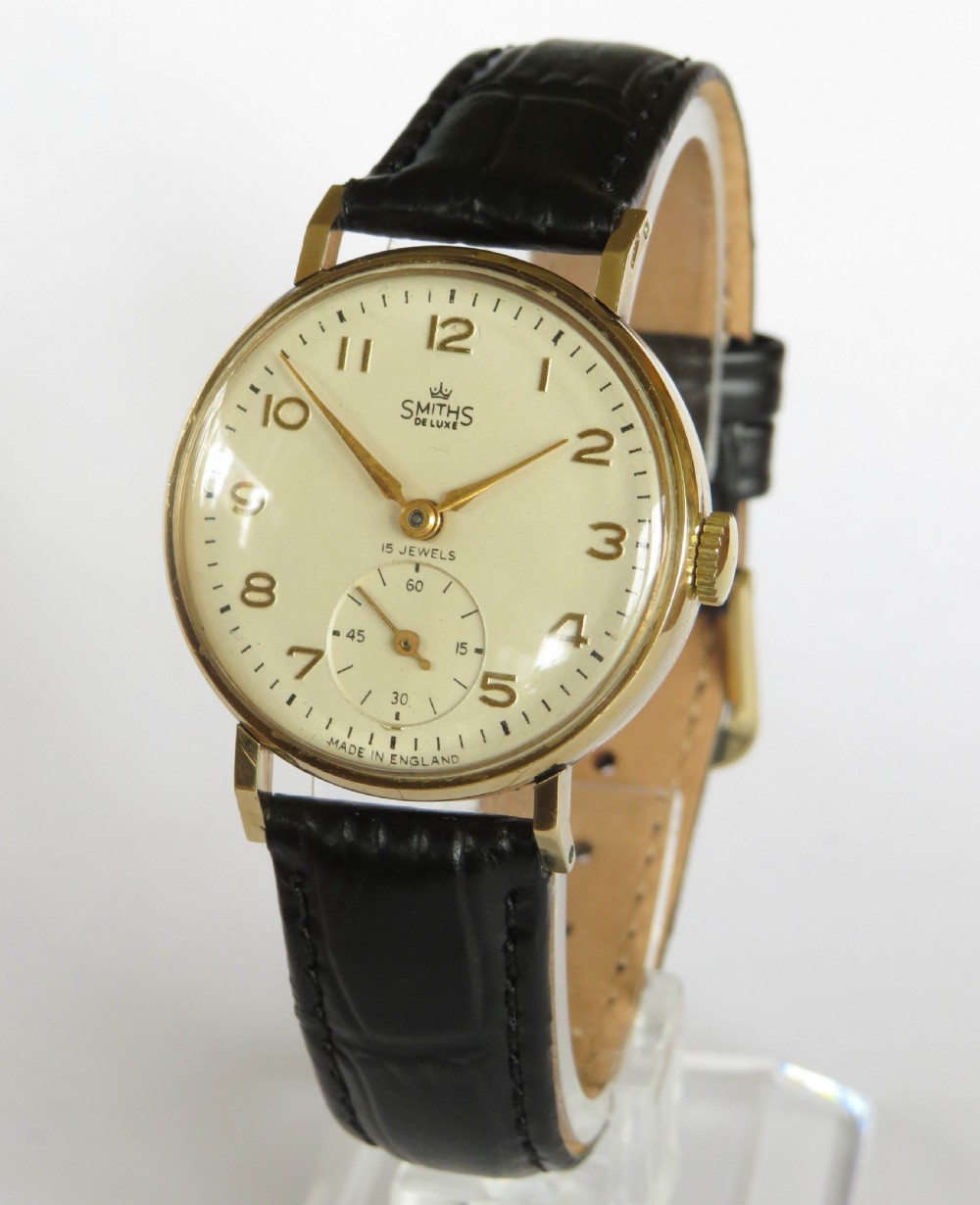 Gents 9ct gold Smiths De Luxe wrist watch, 1955