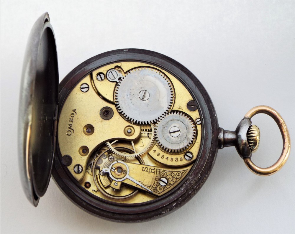 An antique gun metal Omega pocket watch 1914 View V