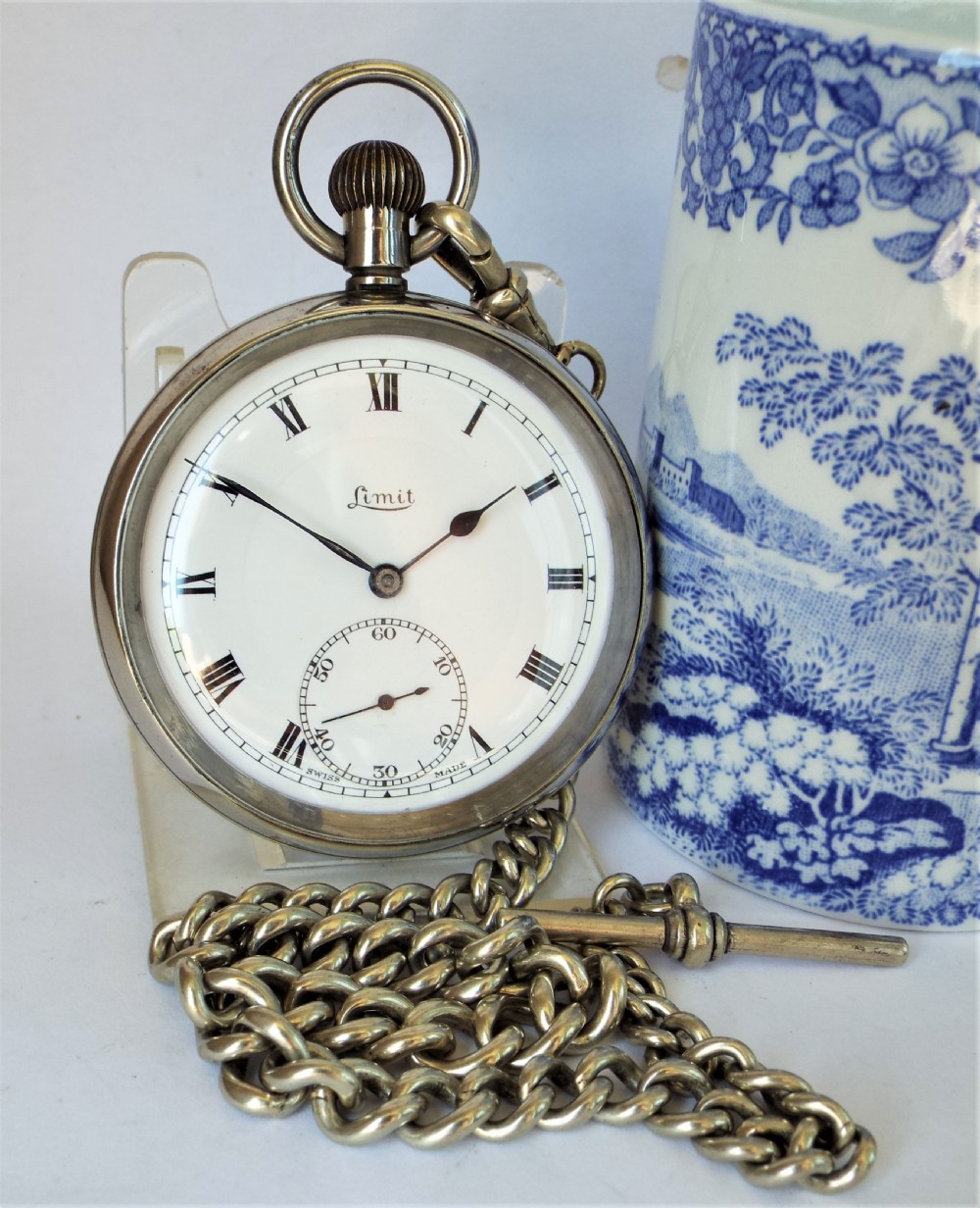 Antique 1920s Limit pocket watch and chain.
