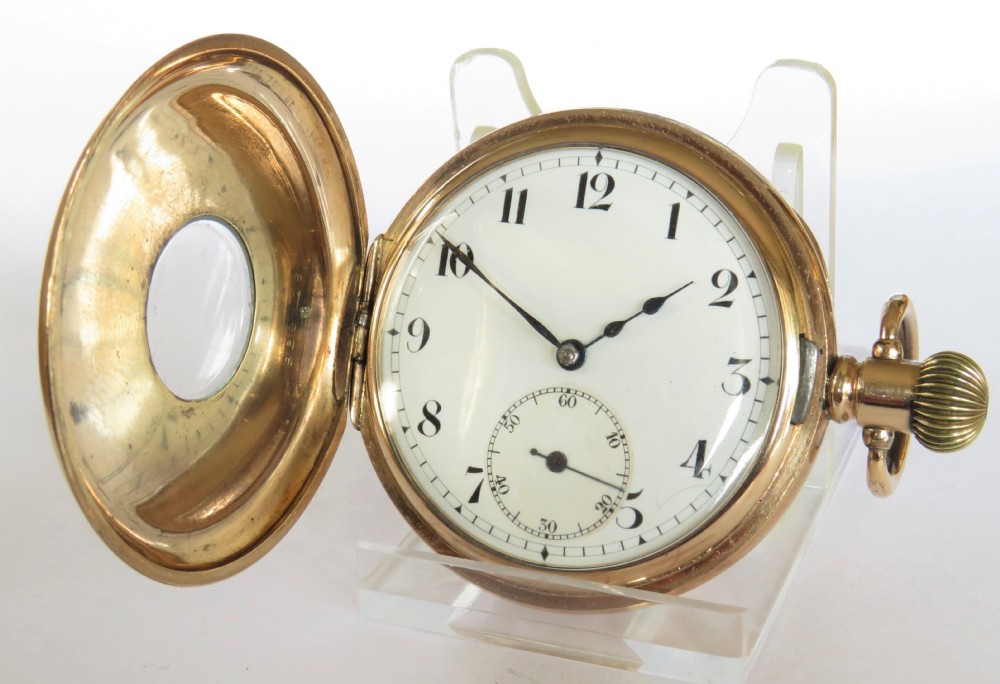 An antique Minerva half hunter pocket watch. View III
