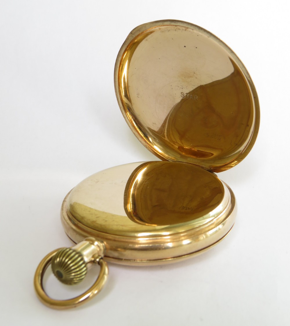 An antique Minerva half hunter pocket watch. View IV