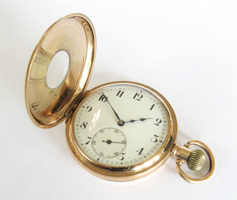An antique Minerva half hunter pocket watch. View VI