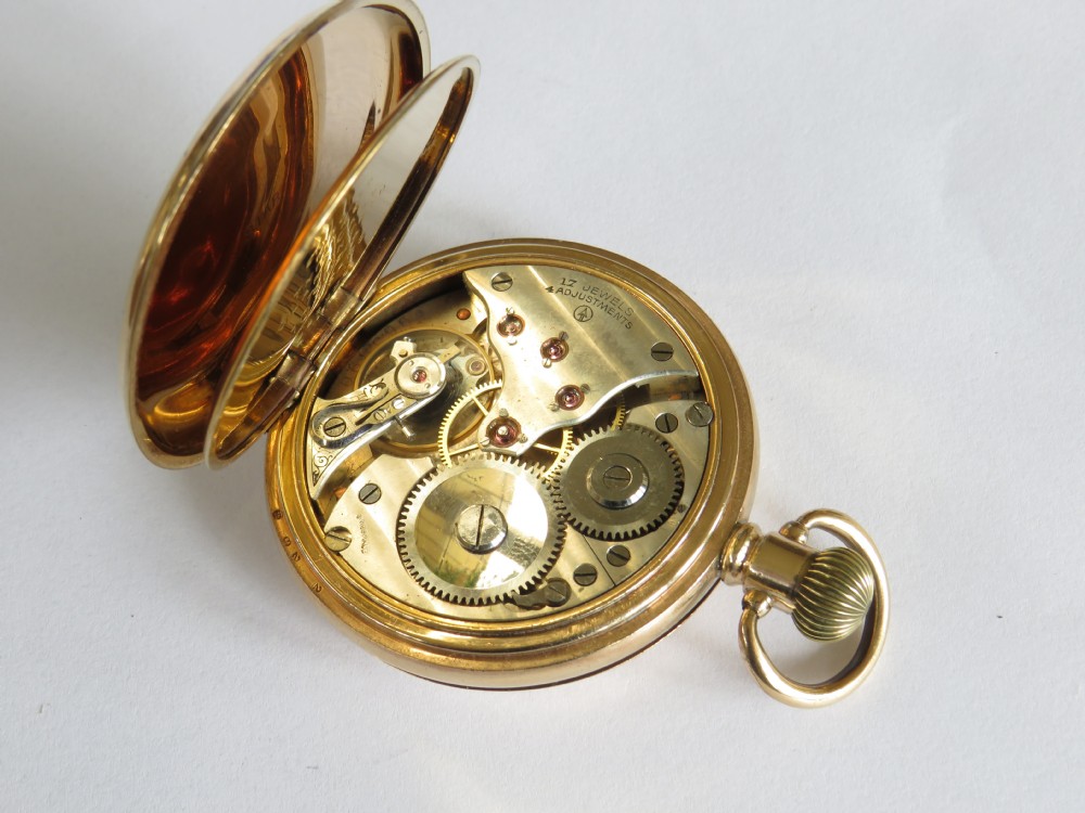 An antique Minerva half hunter pocket watch. View V