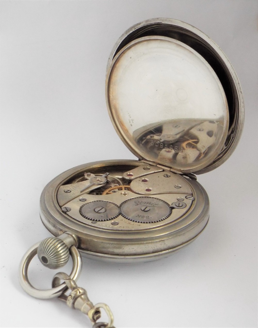 Antique 1920s Limit pocket watch and chain. View V