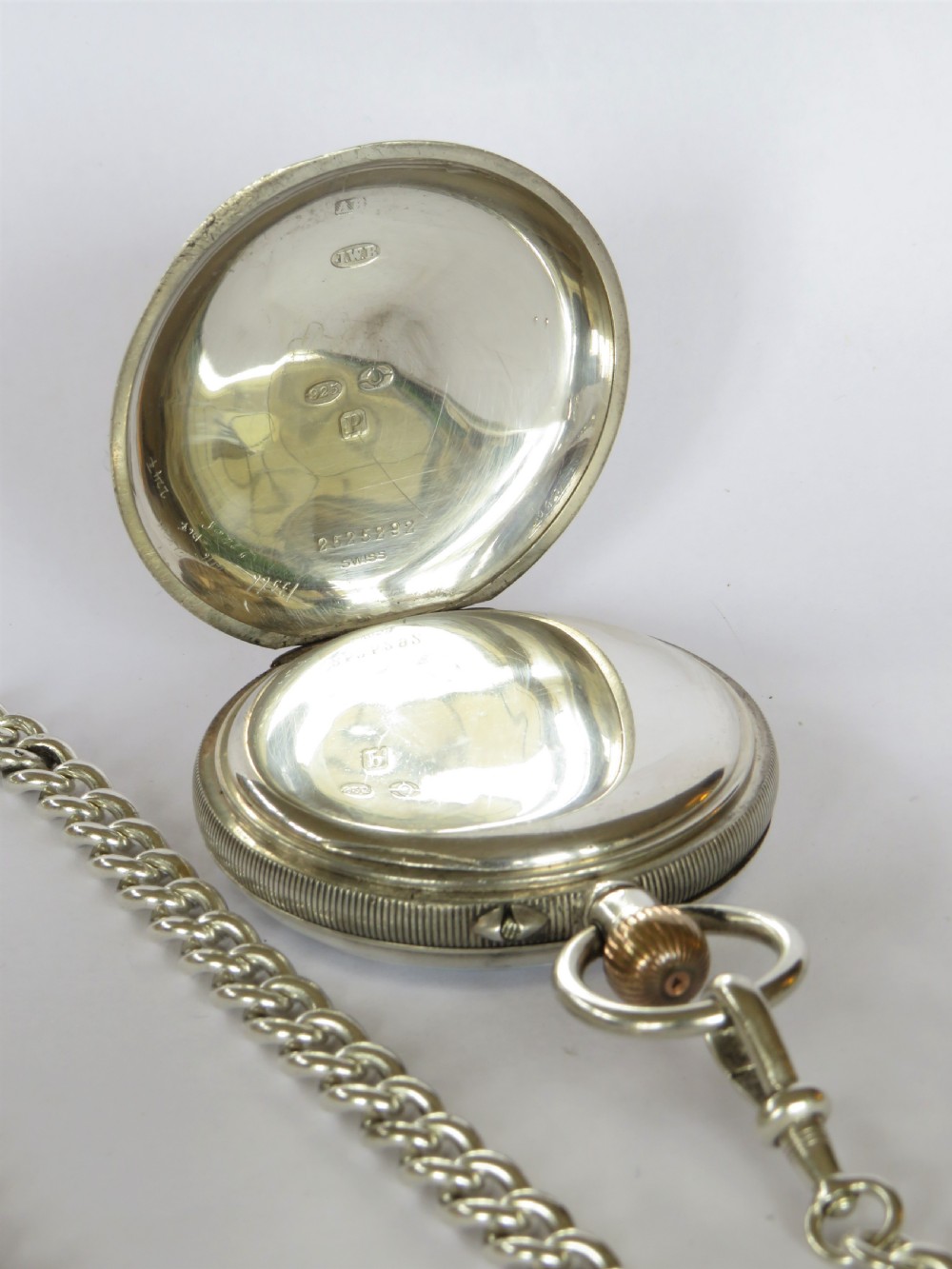 Antique silver Longines pocket watch retailed by J W Benson, and chain View IV