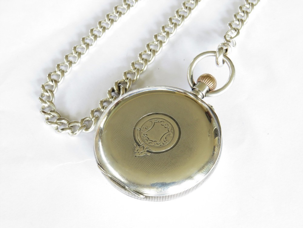 Antique silver Longines pocket watch retailed by J W Benson, and chain View V