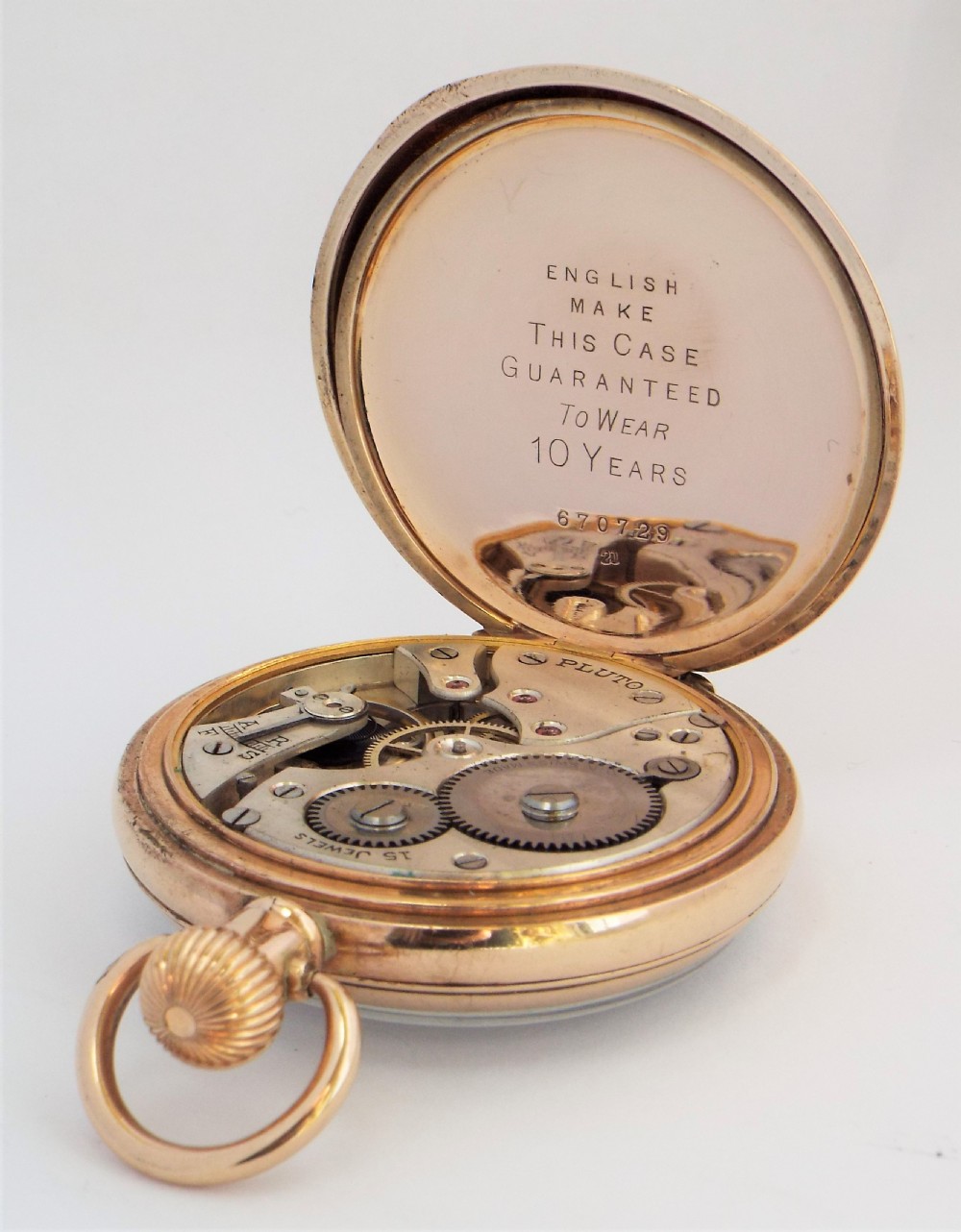 Antique  1920s Pluto stem winding pocket watch. View IV