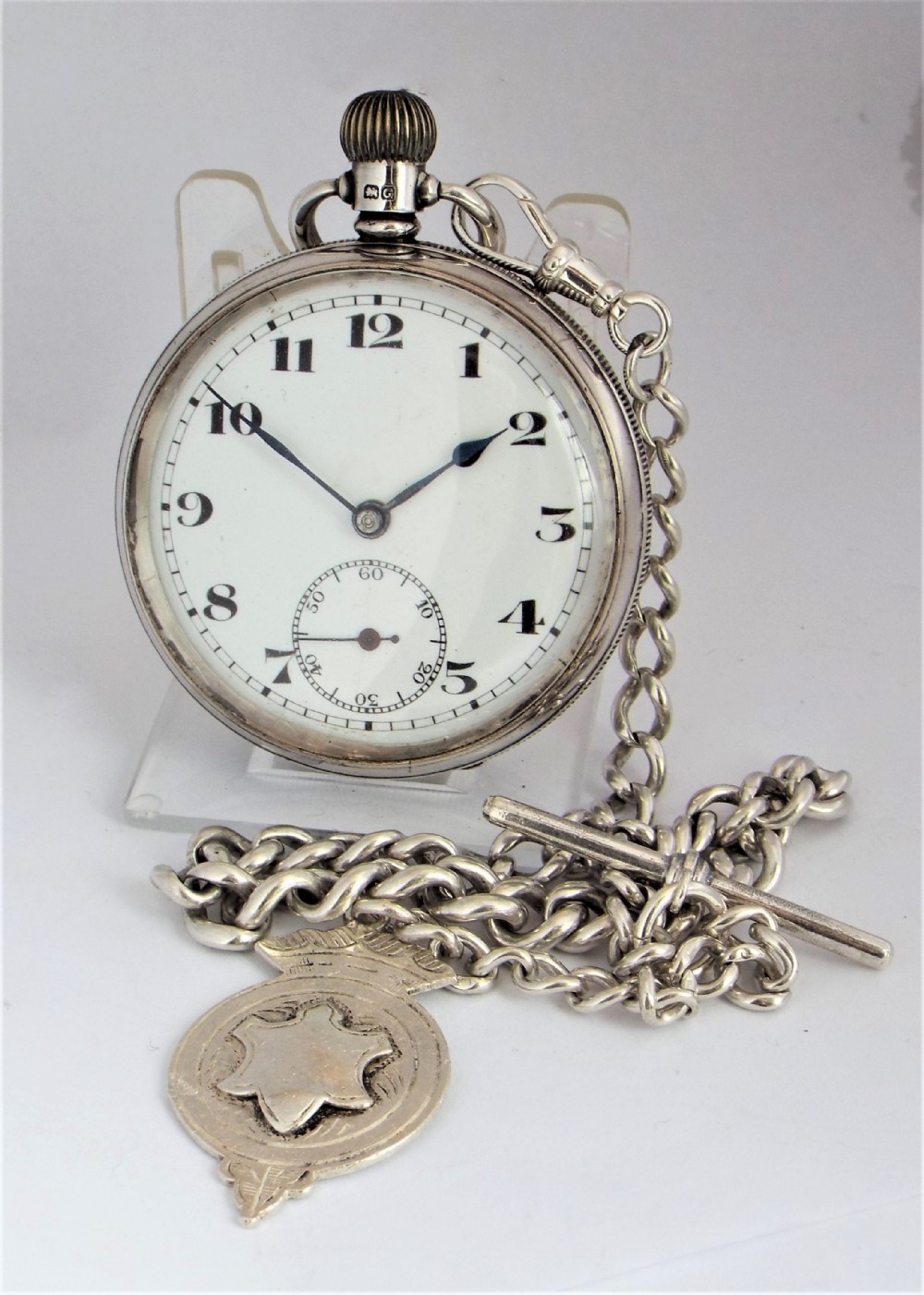1931 silver pocket watch with chain.