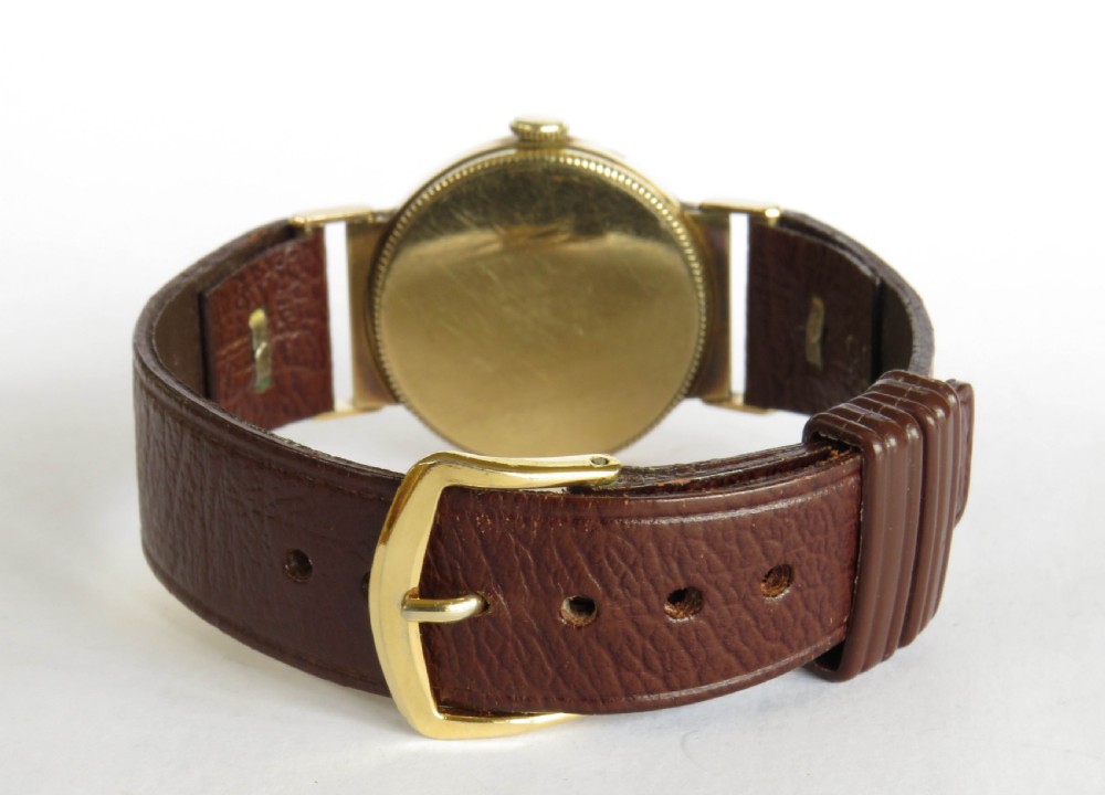 J W Benson 9ct gold mid-size wrist watch, 1949 View V