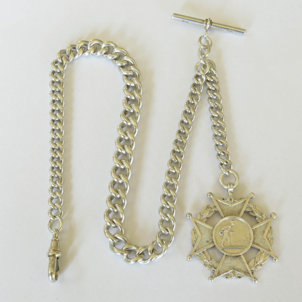 Heavy antique silver watch chain and fob