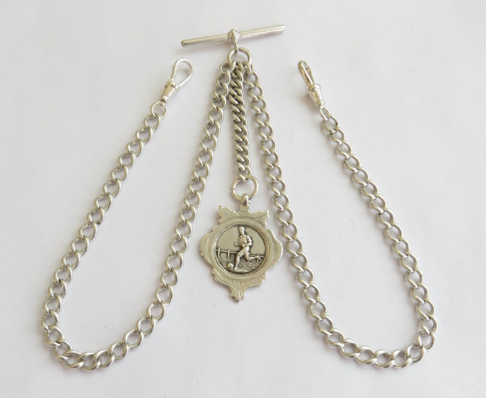 Antique silver double albert with football fob
