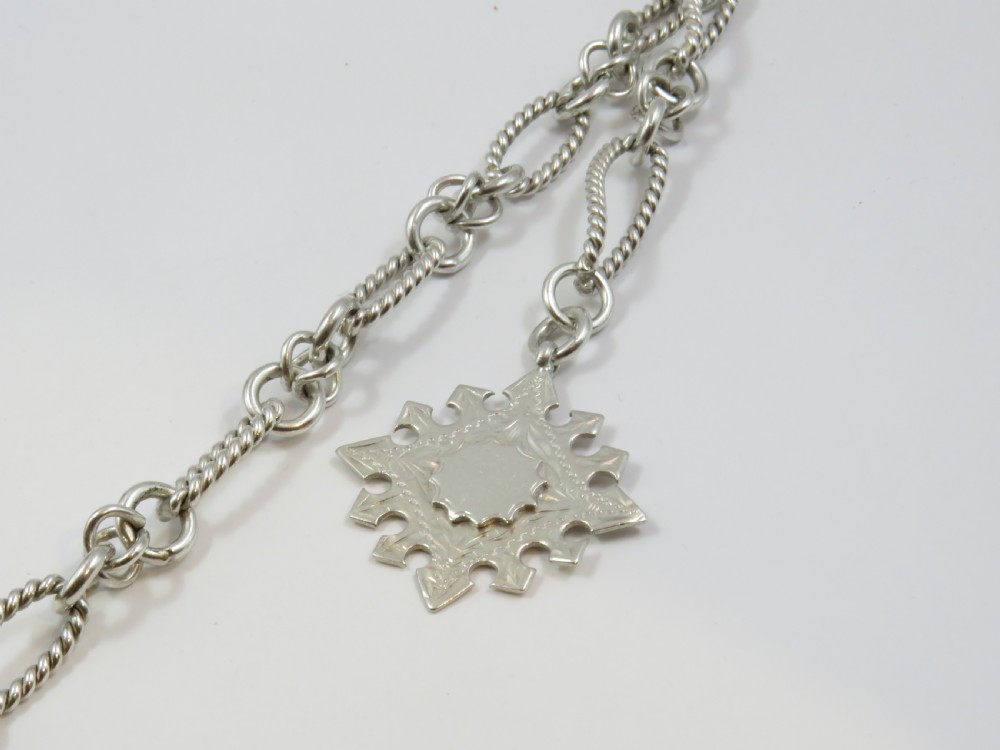 Unusual antique watch chain and fob View II