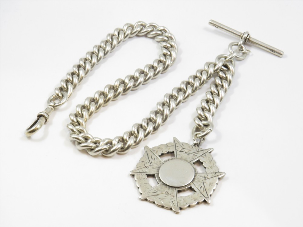 Antique heavy silver watch chain and fob, 1897