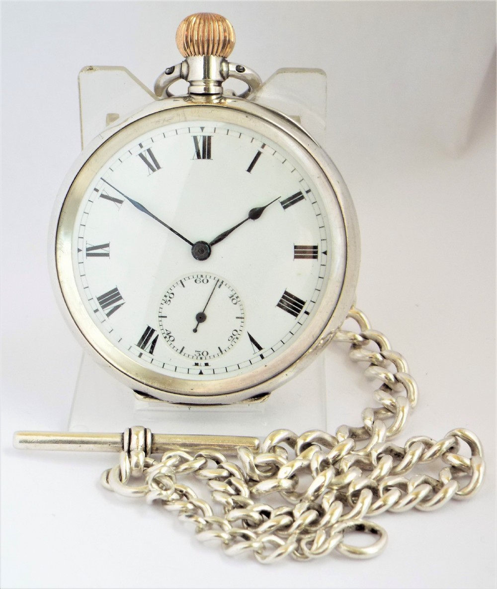 Antique Swiss silver pocket watch and chain. 