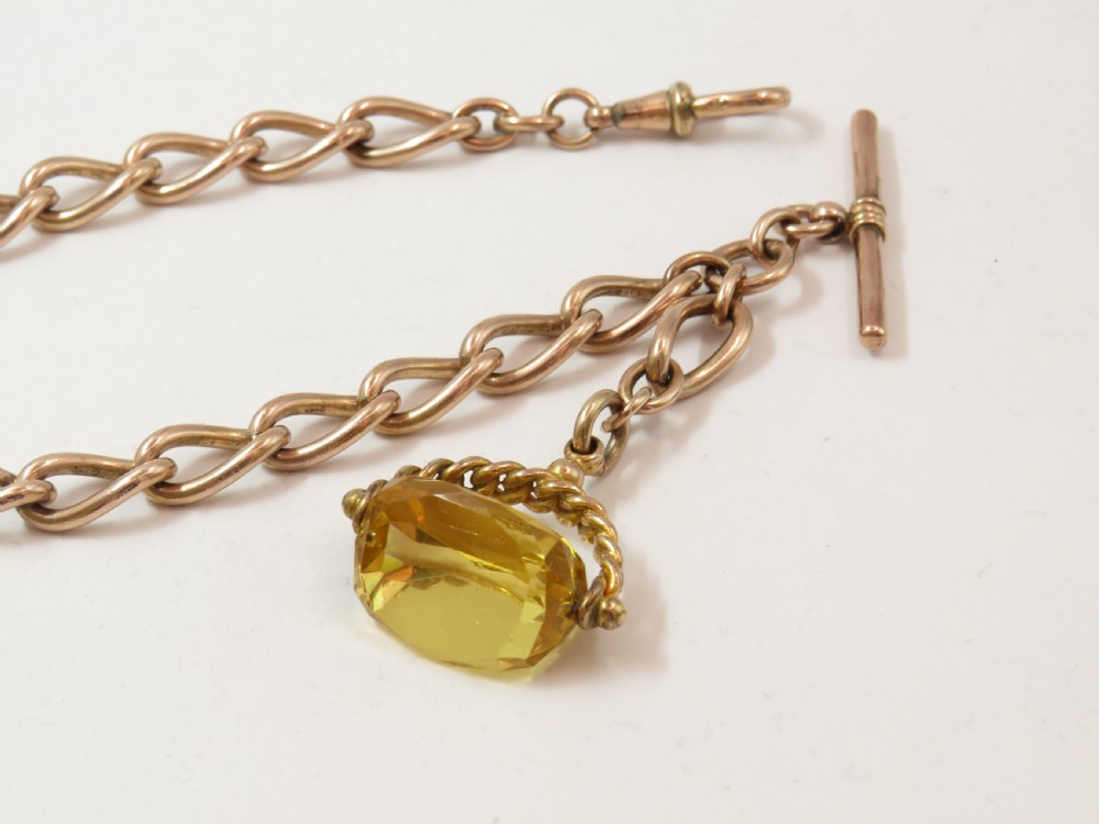 1930s 18ct rolled rose gold watch chain and fob View II