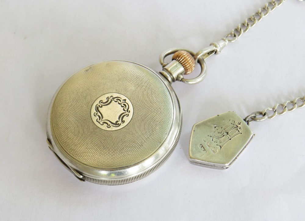 Silver Limit pocket watch, chain and dog locket View V