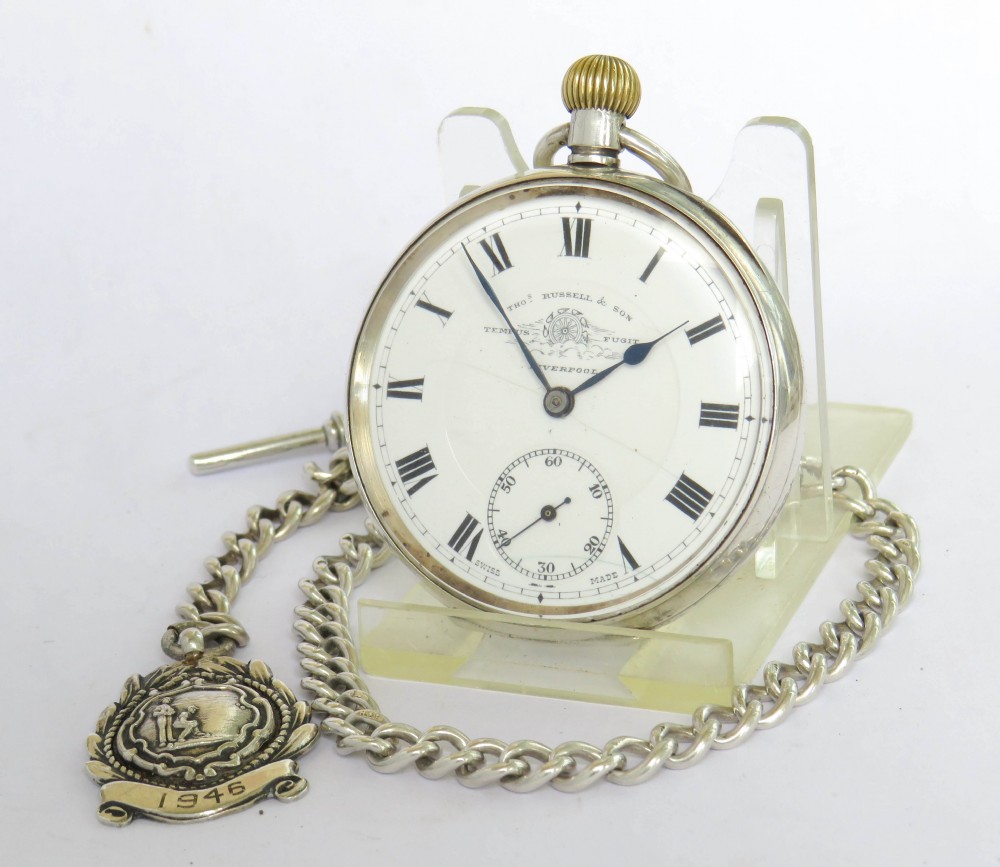 Antique silver Thomas Russell pocket watch and chain.