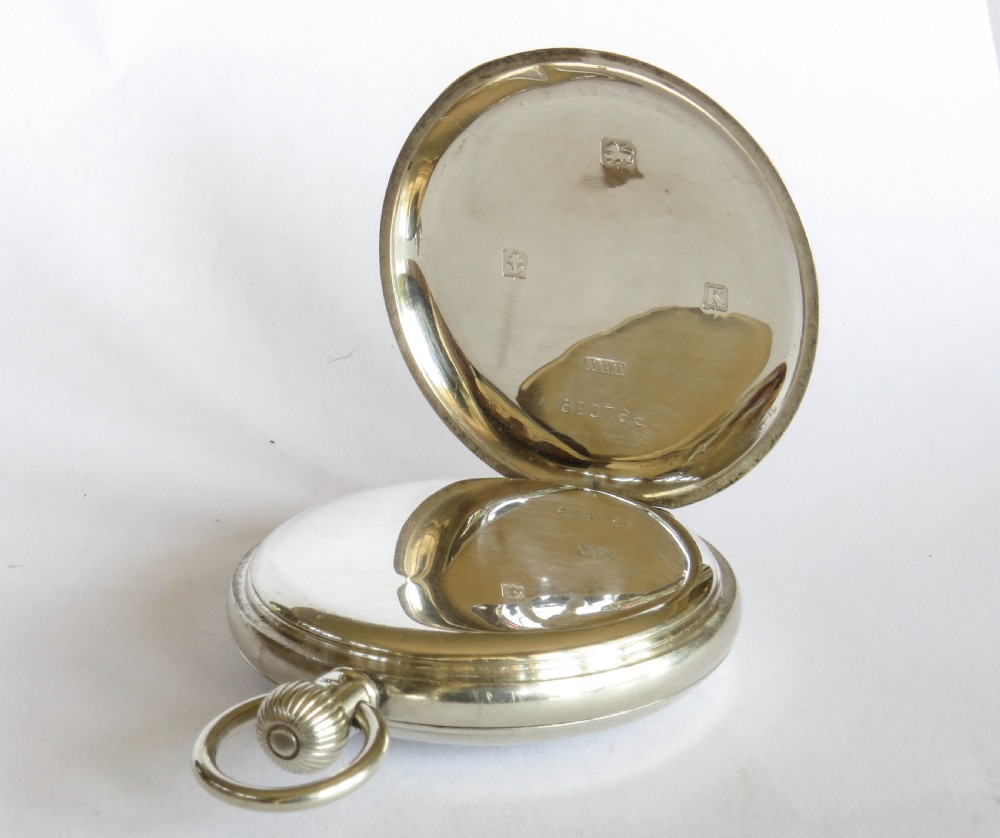 Antique  silver Stauffer & Co hunter pocket watch. View IV