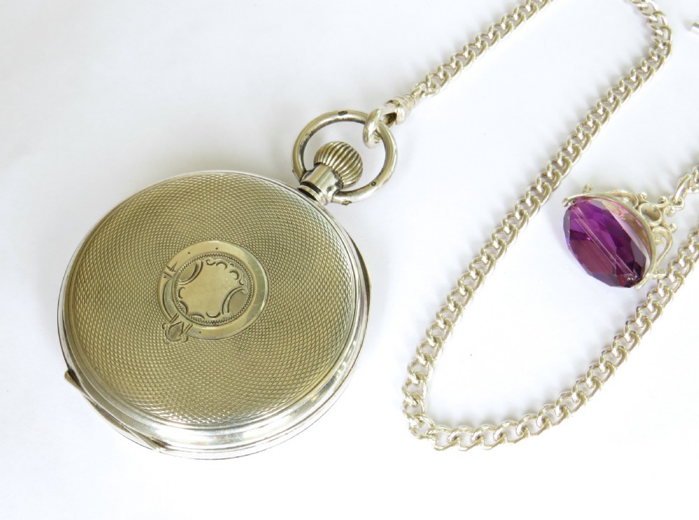 Antique Swiss silver pocket watch and chain View V