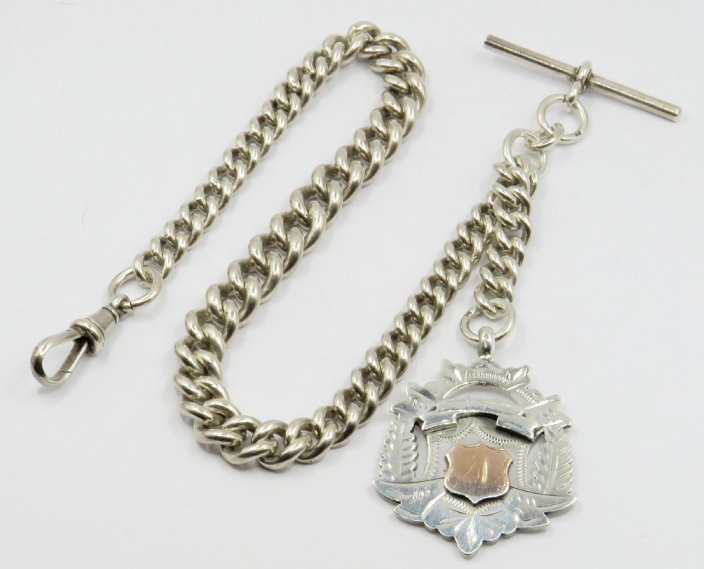 Superb antique silver graduated chain and fob.