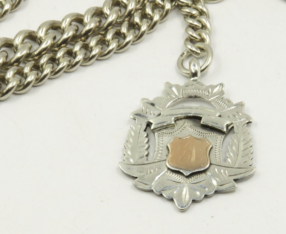 Superb antique silver graduated chain and fob. View II