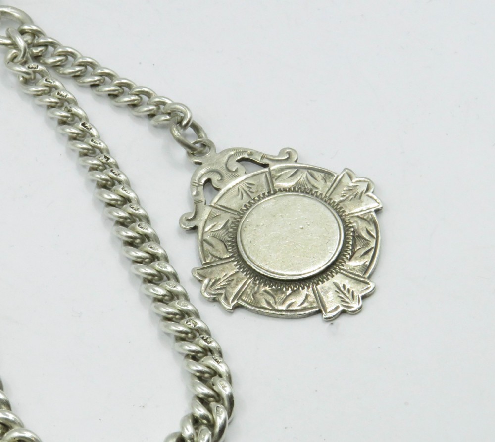 Antique graduated silver watch albert and fob. View II