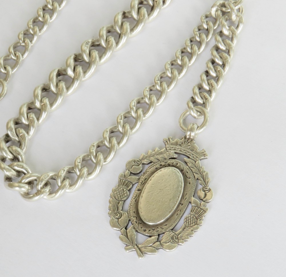 Antique English silver watch chain and fob View II
