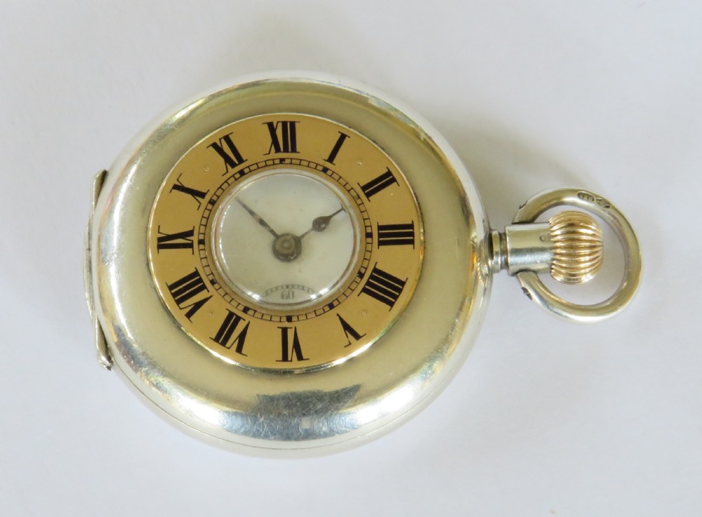 Antique silver and gold half hunter fob watch