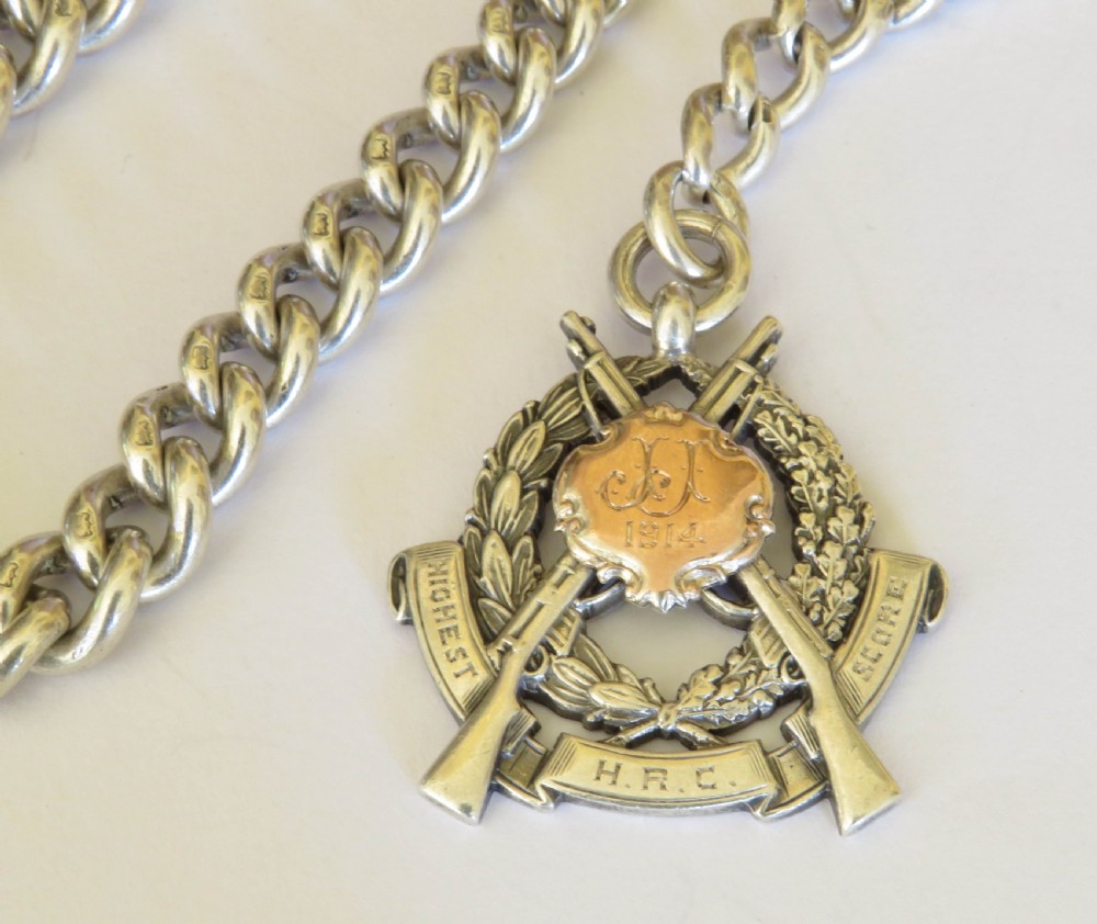 Antique silver watch chain and rifle fob View II