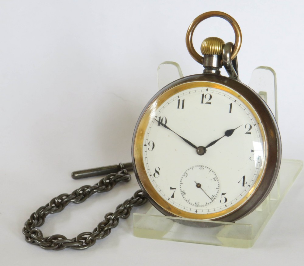 Antique Omega gun metal pocket watch and chain