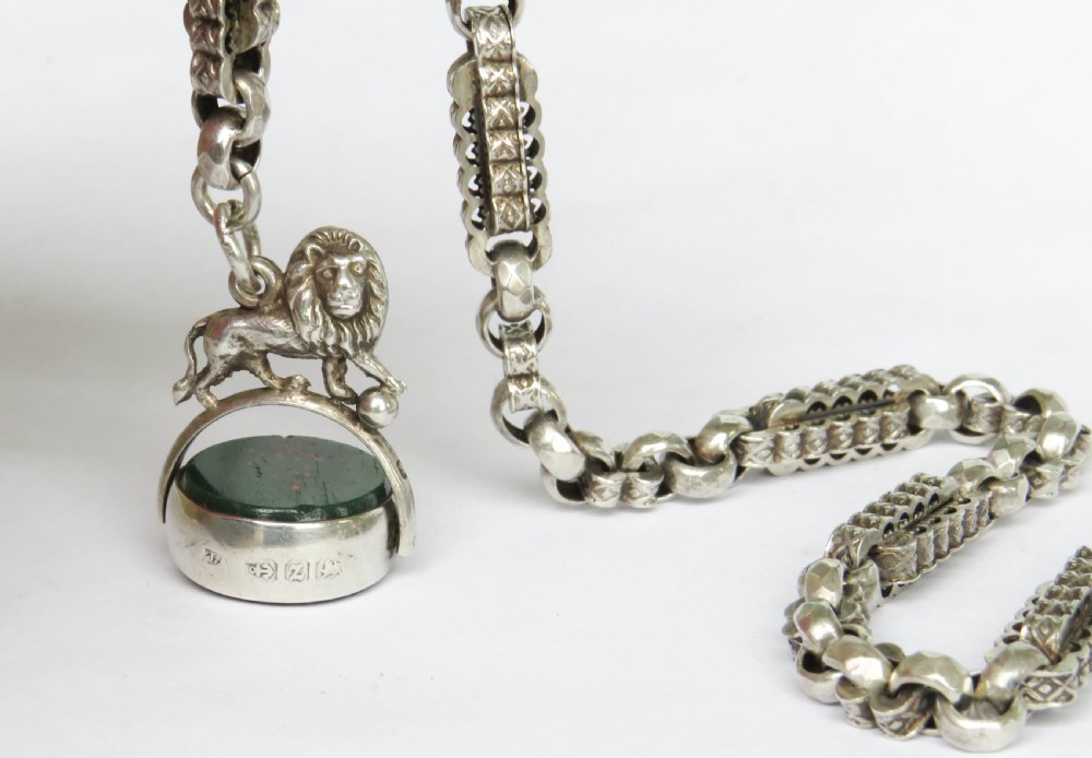 Victorian silver watch chain and lion swivel fob