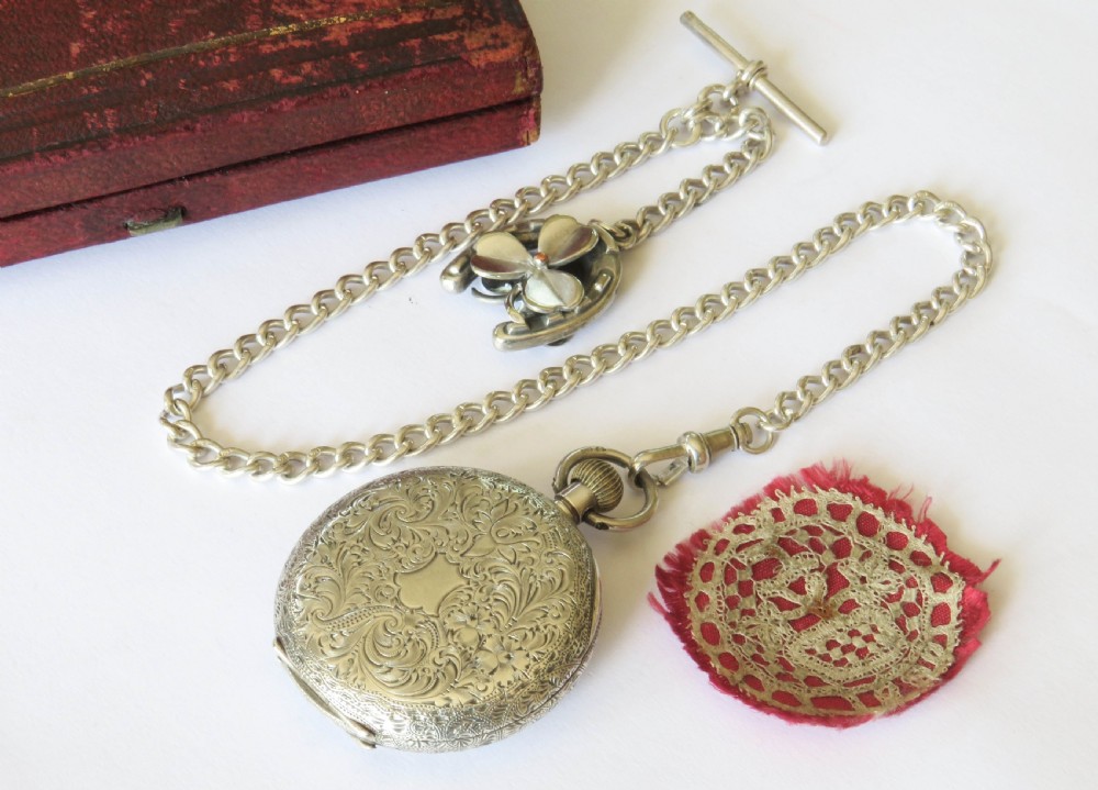 Antique silver fob watch and chain View V