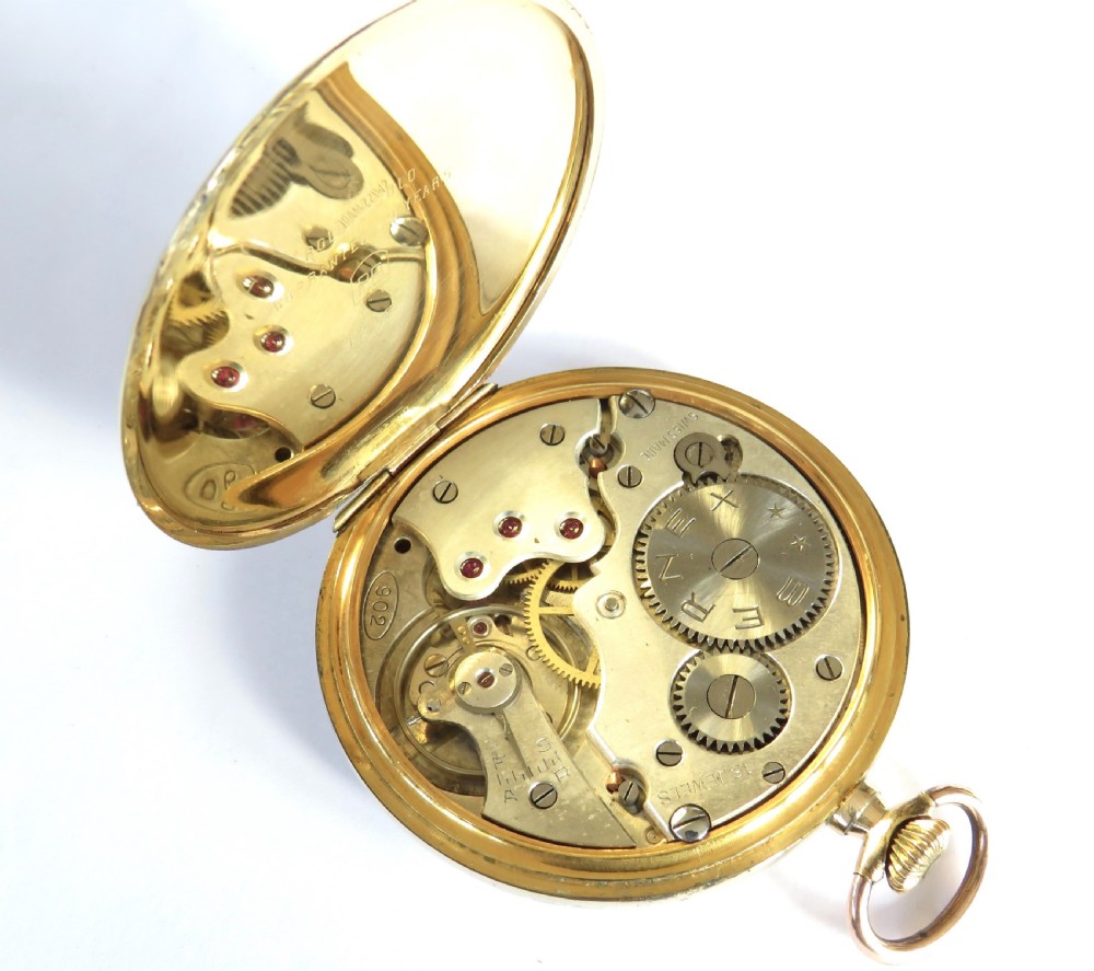 An open-face 1930s Bernex gold pocket watch featuring a cream dial, stylised black Arabic numerals, dark hands, and a sub-seconds dial at six oclock. View III