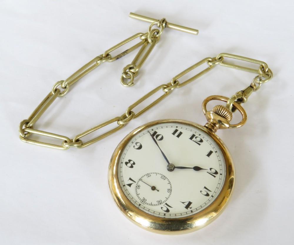 An open-face gold-tone pocket watch featuring a white enamel dial with black Arabic numerals, sub-seconds dial, and attached T-bar chain. View II
