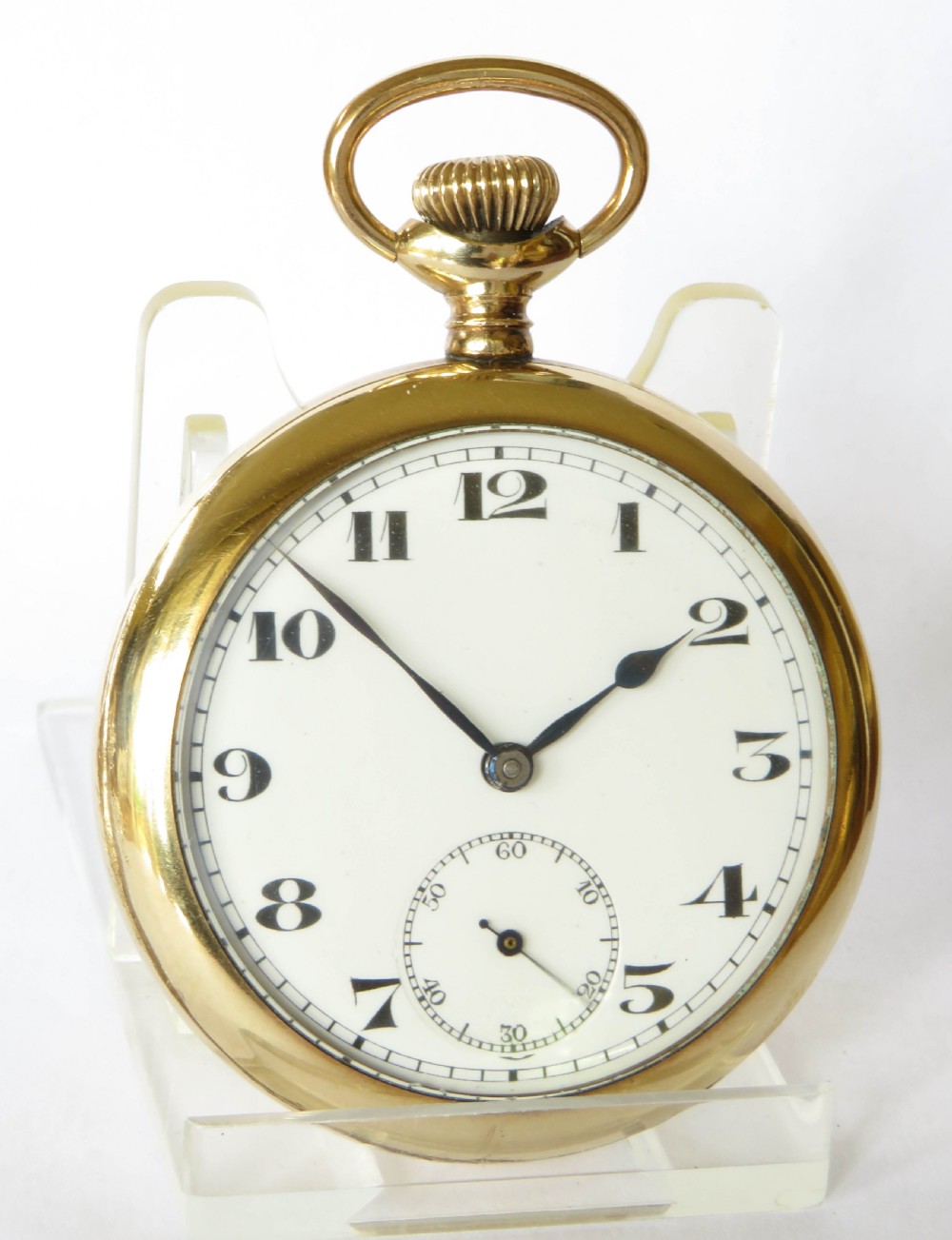 An open-face gold-tone pocket watch featuring a white enamel dial with black Arabic numerals, sub-seconds dial, and attached T-bar chain. View IV