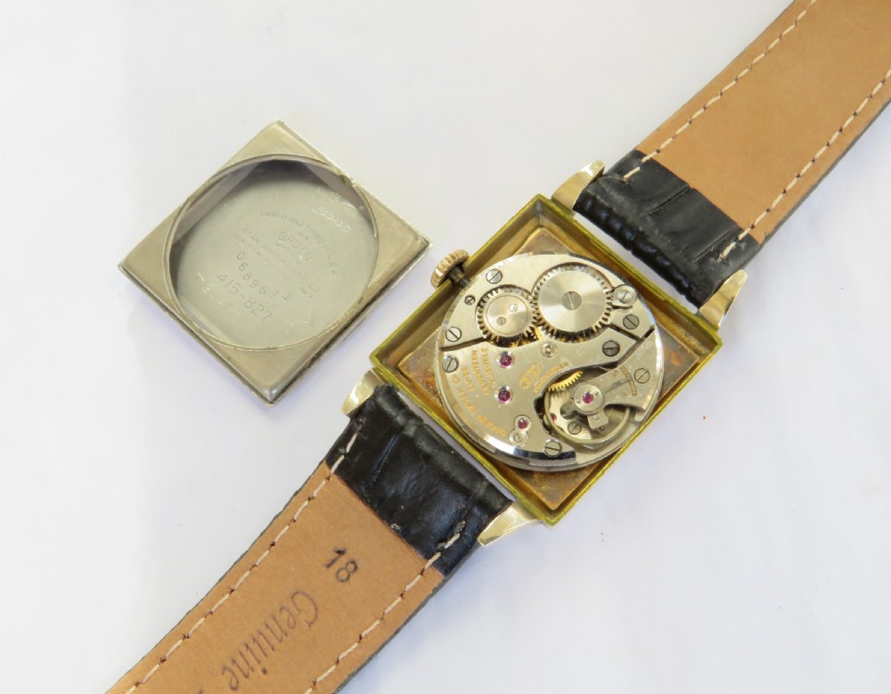 A gents vintage 1950s square gold-cased Gruen Veri-Thin wristwatch with a textured dial and a black alligator-grain leather strap. View III
