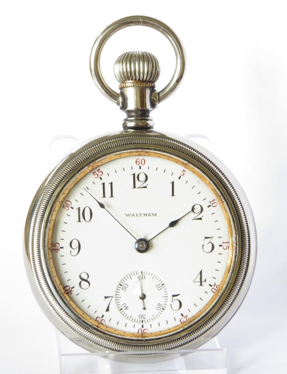 An open-face antique Waltham pocket watch with a white enamel dial, black Arabic numerals, red minute indicators, a subsidiary seconds dial, and a silver-tone metal case. View II